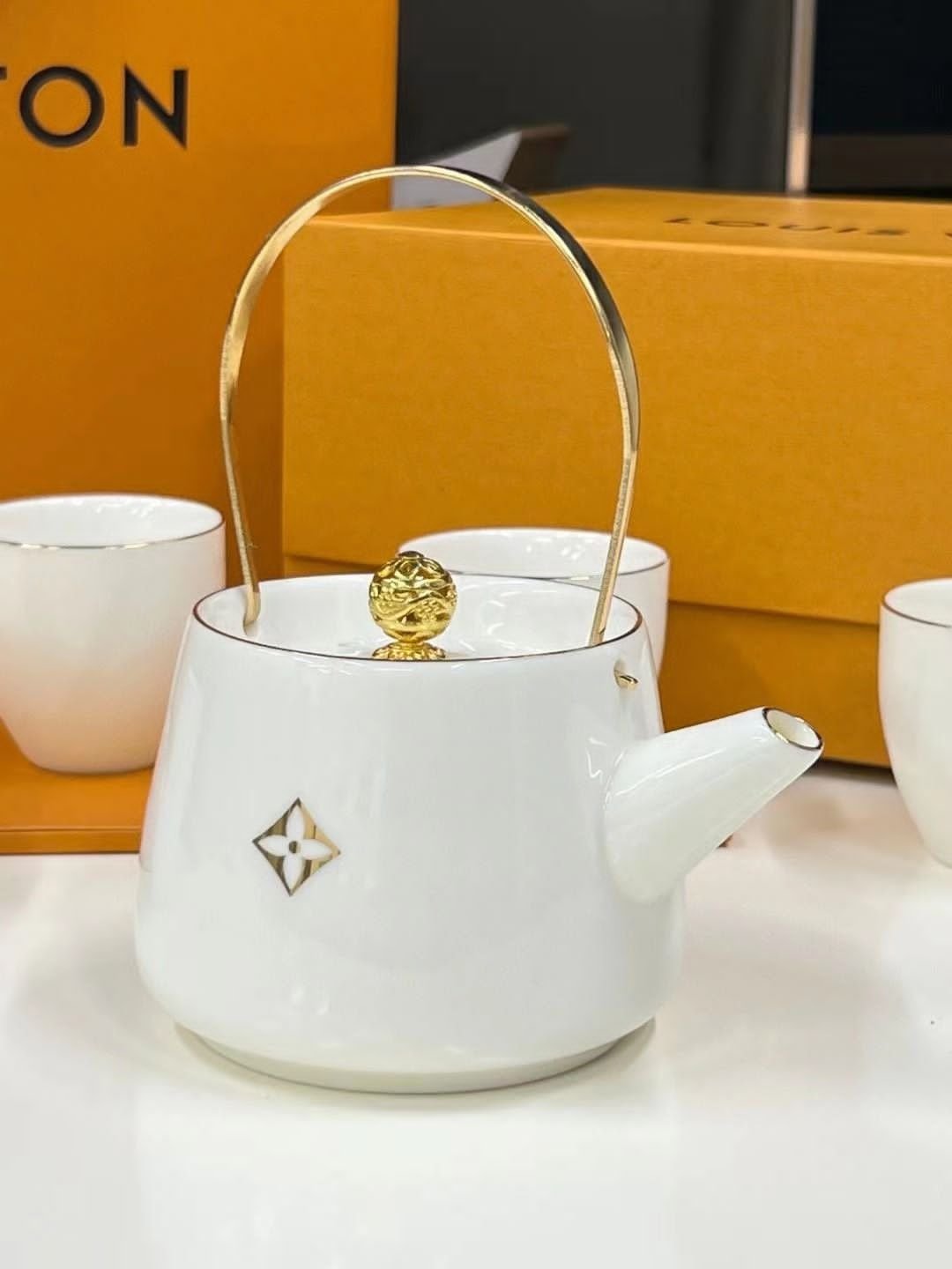 LV Louis Vuitton Tea Pot with four cups, White color - Louis Vuitton Kitchen and Dining | Buy Online in UAE